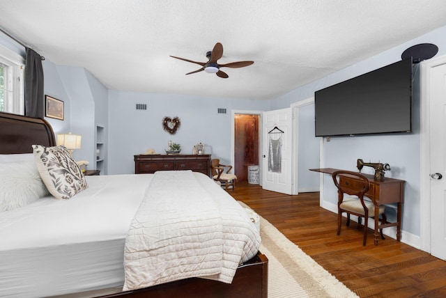 1856 N Rainbow Dr, Memphis, TN 38107 - bedroom with wood finished floors and a ceiling fan