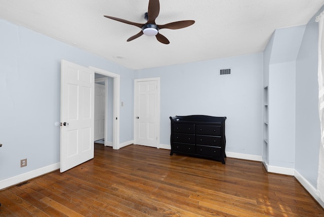 1856 N Rainbow Dr, Memphis, TN 38107 - unfurnished bedroom featuring wood-type flooring and a ceiling fan