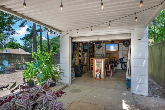 1856 N Rainbow Dr, Memphis, TN 38107 - fenced backyard with a garage