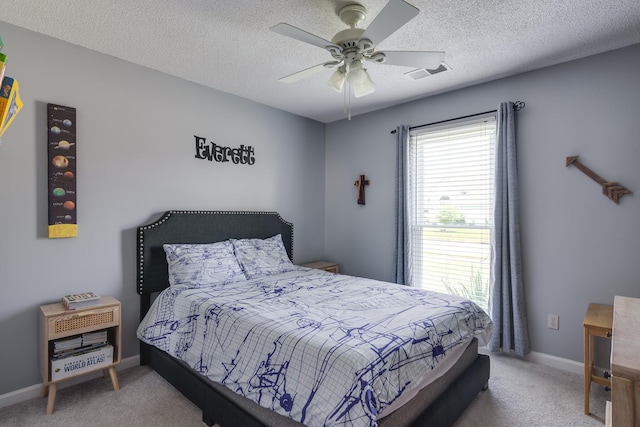 8703 Old River Rd, Memphis, TN 38018 - carpeted bedroom with ceiling fan and a textured ceiling
