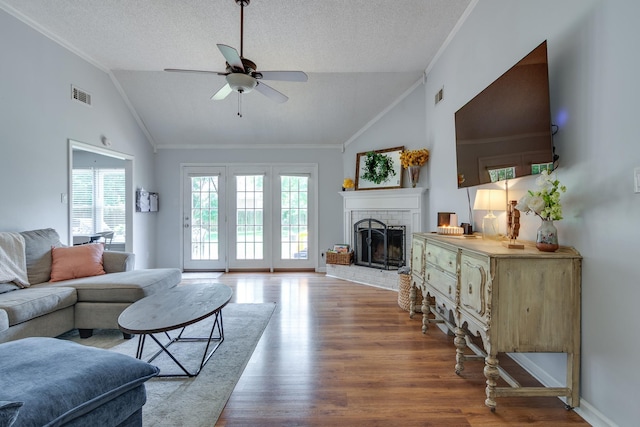 8703 Old River Rd, Memphis, TN 38018 - living area featuring lofted ceiling, wood finished floors, a ceiling fan, healthy amount of natural light, and ornamental molding
