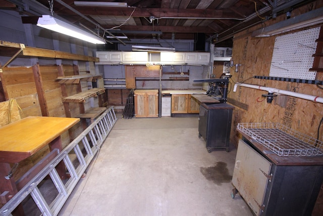 3642 Charlene Rd, Bartlett, TN 38135 - below grade area with a workshop area and wooden walls