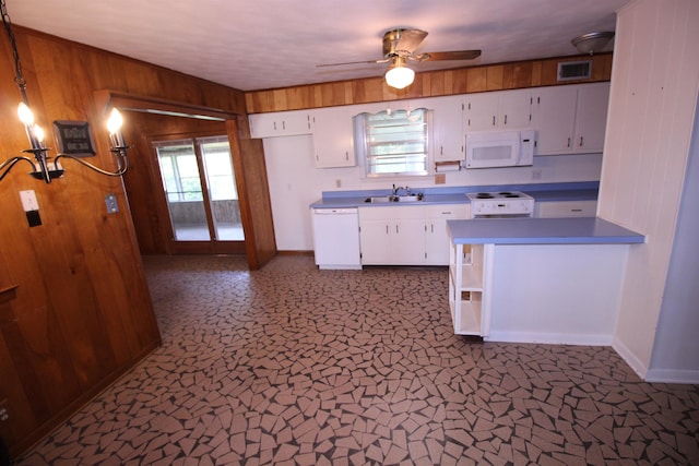 3642 Charlene Rd, Bartlett, TN 38135 - kitchen with white appliances, wooden walls, white cabinets, healthy amount of natural light, and ceiling fan