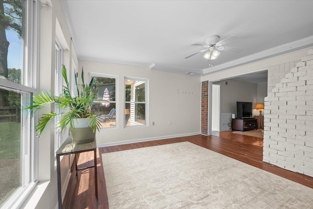1469 Poplar Estates Pkwy, Germantown, TN 38138 - spare room with wood finished floors, crown molding, and ceiling fan