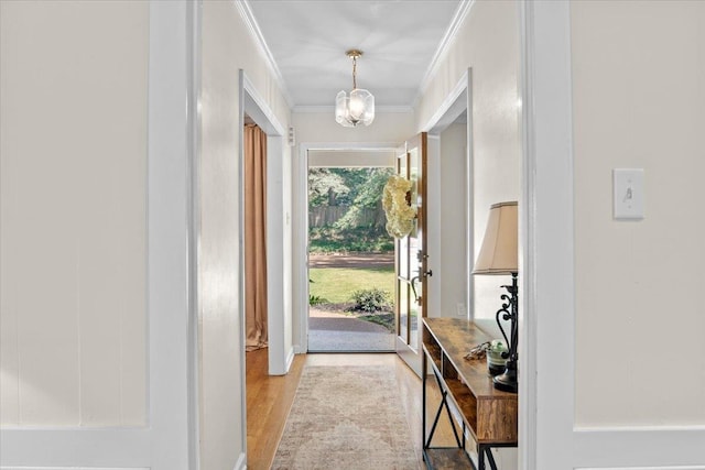 1469 Poplar Estates Pkwy, Germantown, TN 38138 - doorway to outside with ornamental molding and light wood-style floors