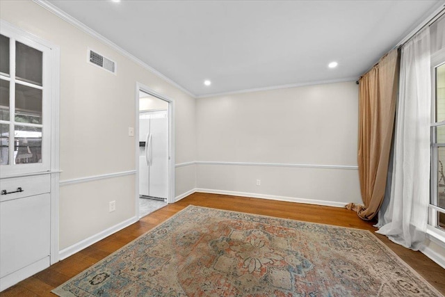 1469 Poplar Estates Pkwy, Germantown, TN 38138 - empty room with crown molding, wood finished floors, and recessed lighting