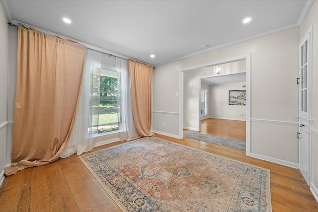 1469 Poplar Estates Pkwy, Germantown, TN 38138 - spare room with wood finished floors, recessed lighting, and crown molding