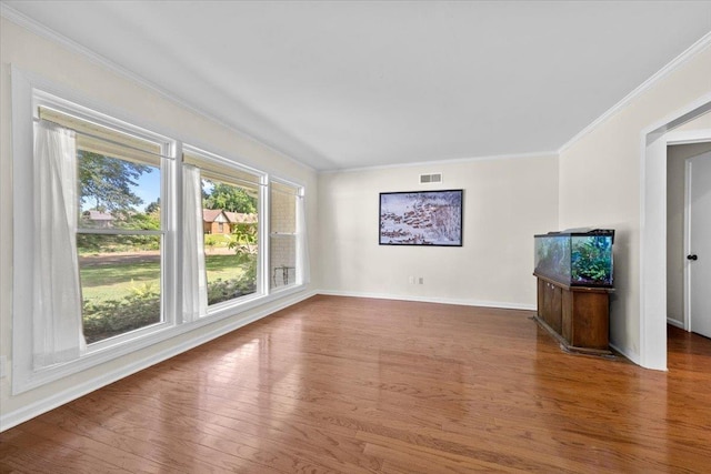 1469 Poplar Estates Pkwy, Germantown, TN 38138 - unfurnished living room featuring crown molding and wood finished floors