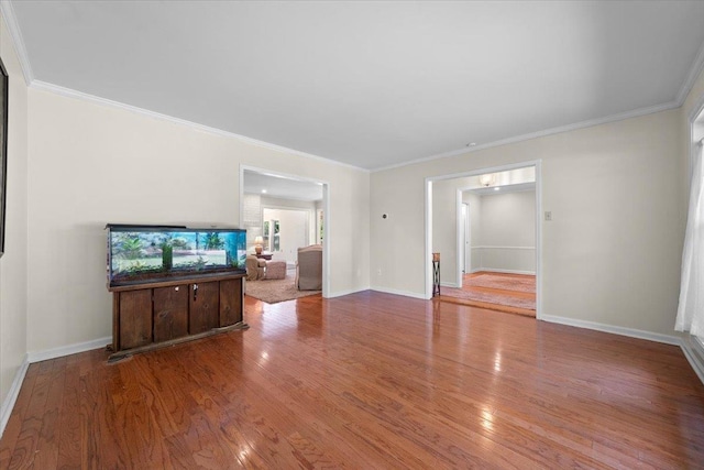 1469 Poplar Estates Pkwy, Germantown, TN 38138 - unfurnished living room with wood finished floors and ornamental molding