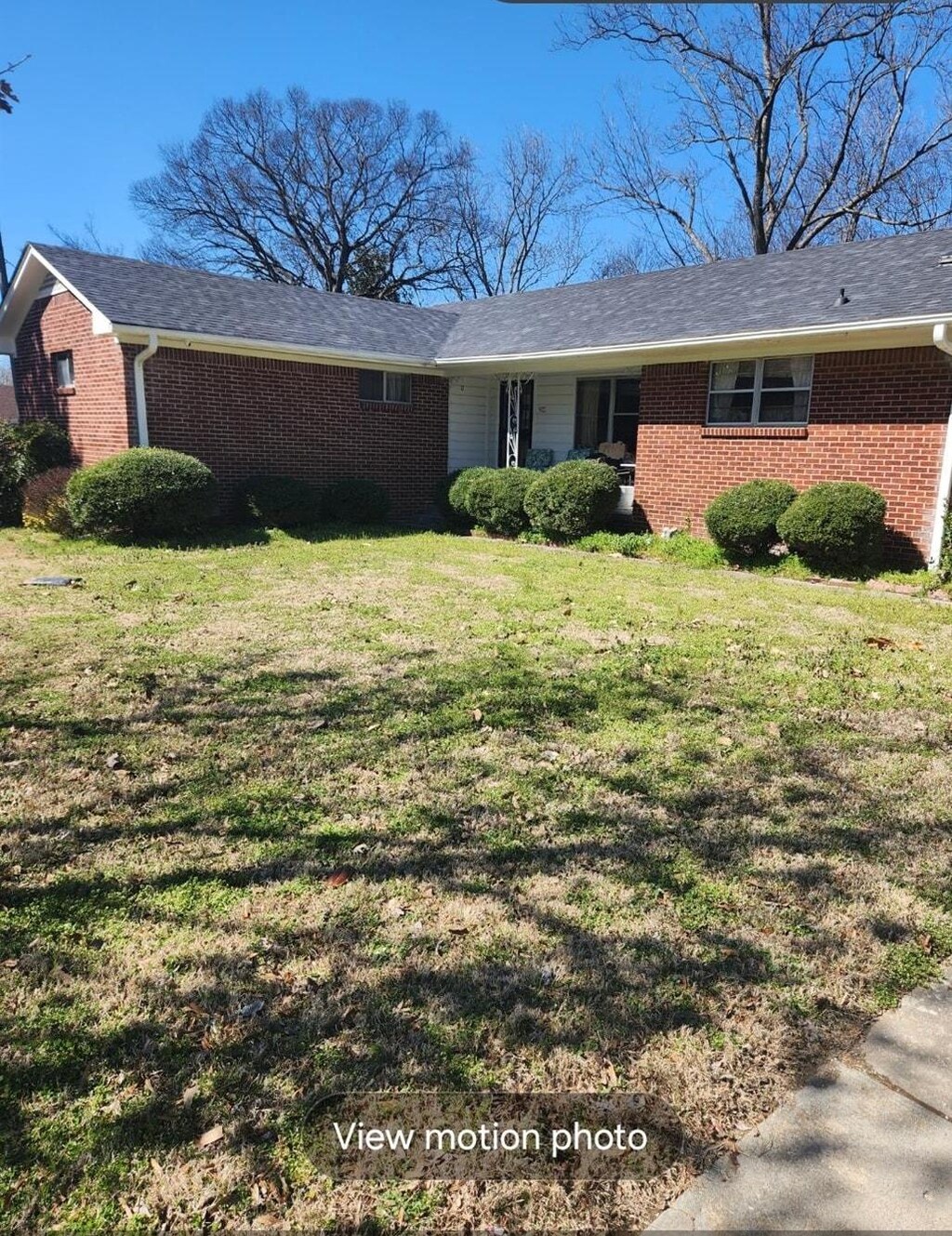 902 Hatchie Ave, Covington, TN 38019 - ranch-style house featuring brick siding and a front yard