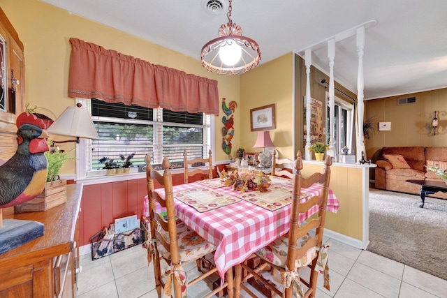 6385 Easthampton Cv, Bartlett, TN 38134 - dining room with light tile patterned floors and light colored carpet