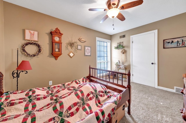 6385 Easthampton Cv, Bartlett, TN 38134 - carpeted bedroom with ceiling fan and baseboards