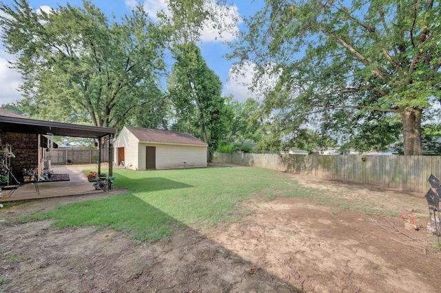 6385 Easthampton Cv, Bartlett, TN 38134 - fenced backyard with an outdoor structure and a patio