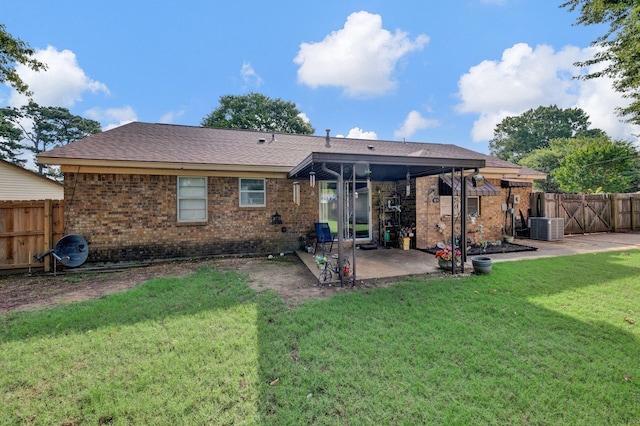 6385 Easthampton Cv, Bartlett, TN 38134 - back of house featuring a patio, brick siding, a fenced backyard, and a gate