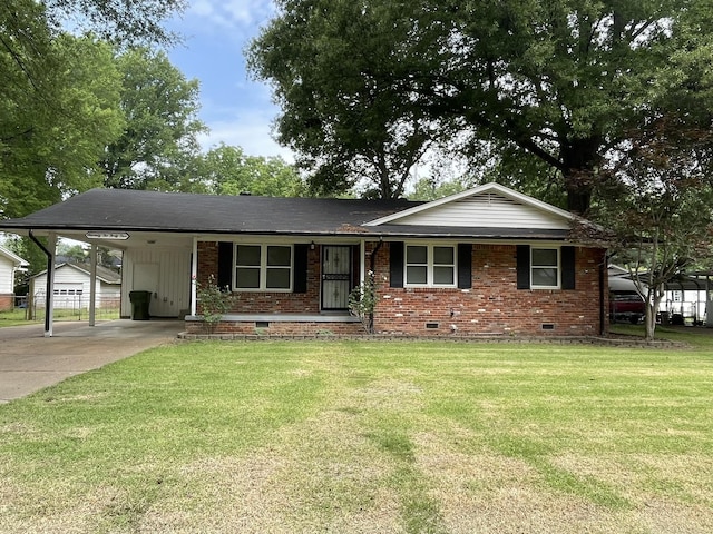 7241 Renda St, Millington, TN 38053 - ranch-style home with crawl space, brick siding, a front yard, driveway, and an attached carport