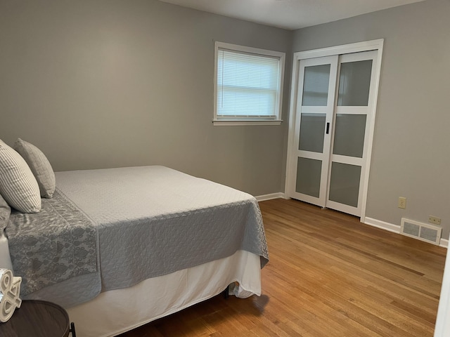 7241 Renda St, Millington, TN 38053 - bedroom with wood finished floors and a closet