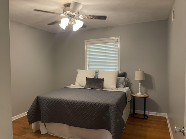 7241 Renda St, Millington, TN 38053 - bedroom with wood finished floors and ceiling fan