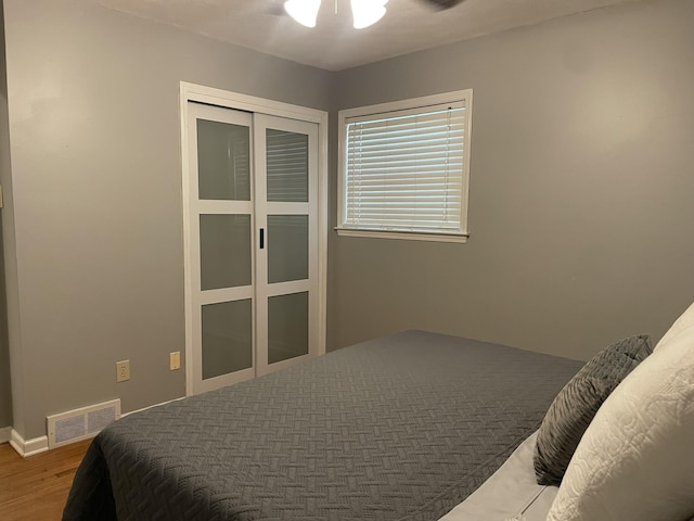 7241 Renda St, Millington, TN 38053 - bedroom with wood finished floors, a closet, and ceiling fan