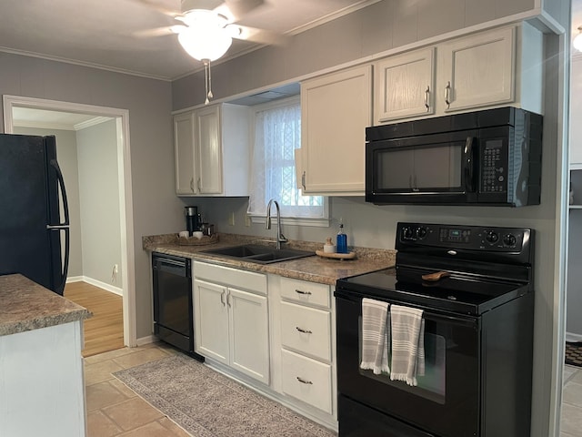 7241 Renda St, Millington, TN 38053 - kitchen with black appliances, crown molding, white cabinets, a ceiling fan, and light countertops