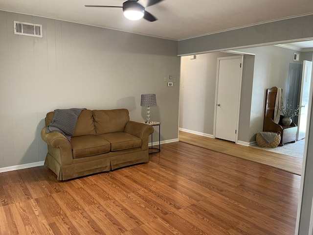7241 Renda St, Millington, TN 38053 - living room with ceiling fan, light wood-style flooring, and crown molding
