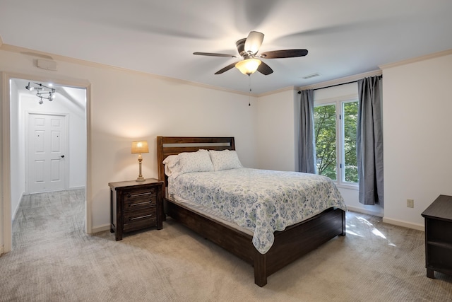 236 Riveredge Cv, Memphis, TN 38018 - bedroom with light carpet, ornamental molding, and ceiling fan