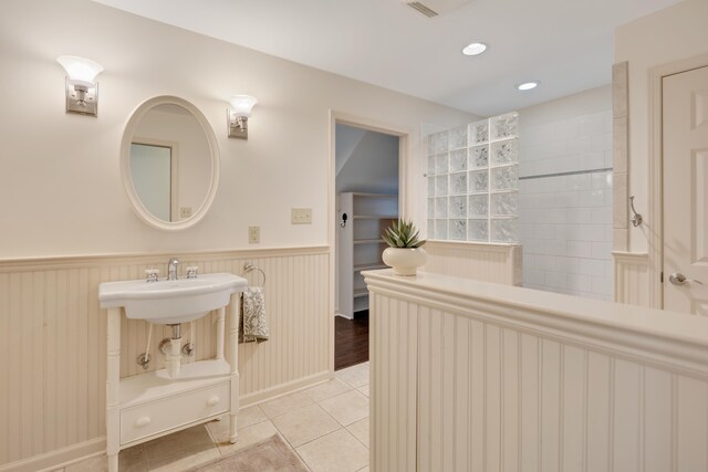 236 Riveredge Cv, Memphis, TN 38018 - bathroom featuring wainscoting, tile patterned floors, walk in shower, and recessed lighting