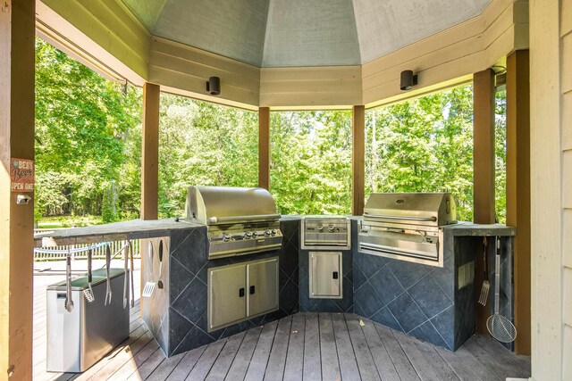 236 Riveredge Cv, Memphis, TN 38018 - wooden terrace with exterior kitchen