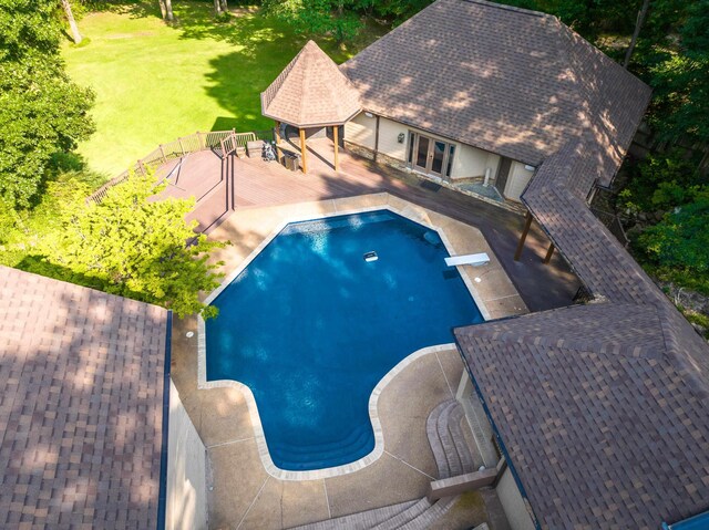 236 Riveredge Cv, Memphis, TN 38018 - outdoor pool featuring a wooden deck, a diving board, a lawn, french doors, and a gazebo