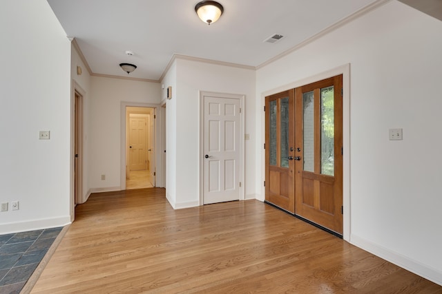 236 Riveredge Cv, Memphis, TN 38018 - foyer entrance featuring ornamental molding, light wood-style floors, and french doors