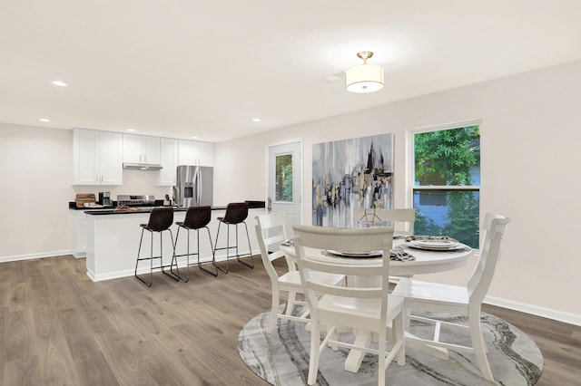 3374 Given Ave, Memphis, TN 38122 - dining area with wood finished floors and recessed lighting