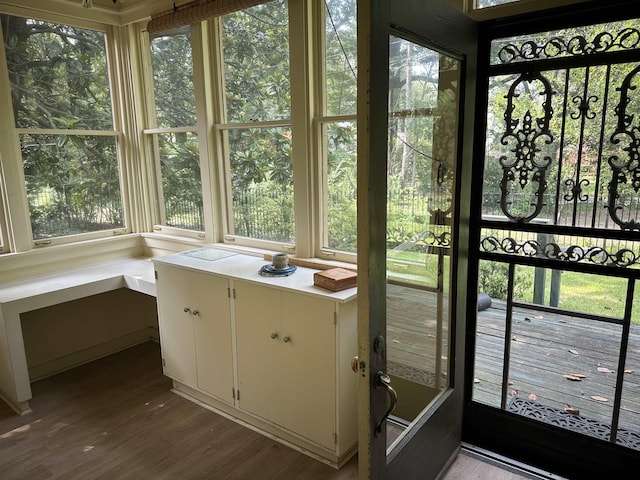 4042 Goodlett Cv, Memphis, TN 38111 - unfurnished sunroom with wood finished floors and a wooden deck