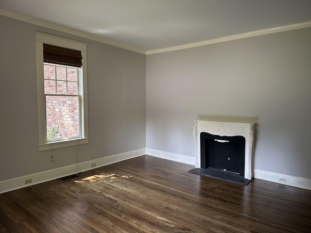 4042 Goodlett Cv, Memphis, TN 38111 - unfurnished living room featuring dark wood-style flooring, ornamental molding, and a fireplace with raised hearth
