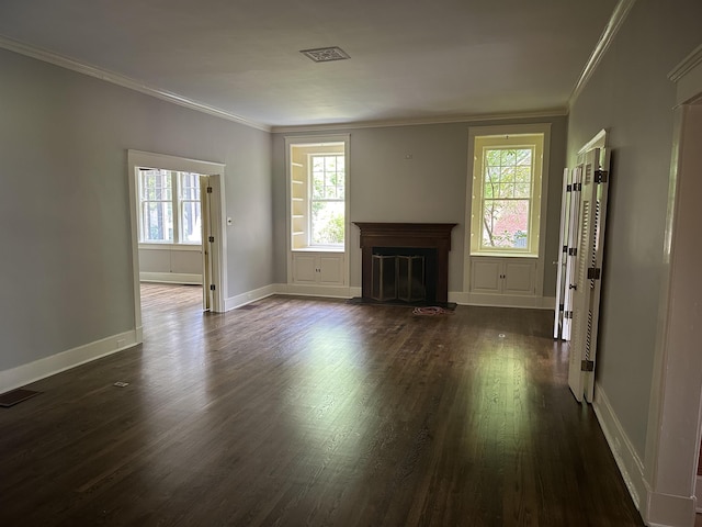 4042 Goodlett Cv, Memphis, TN 38111 - unfurnished living room with crown molding, dark wood-type flooring, and a fireplace