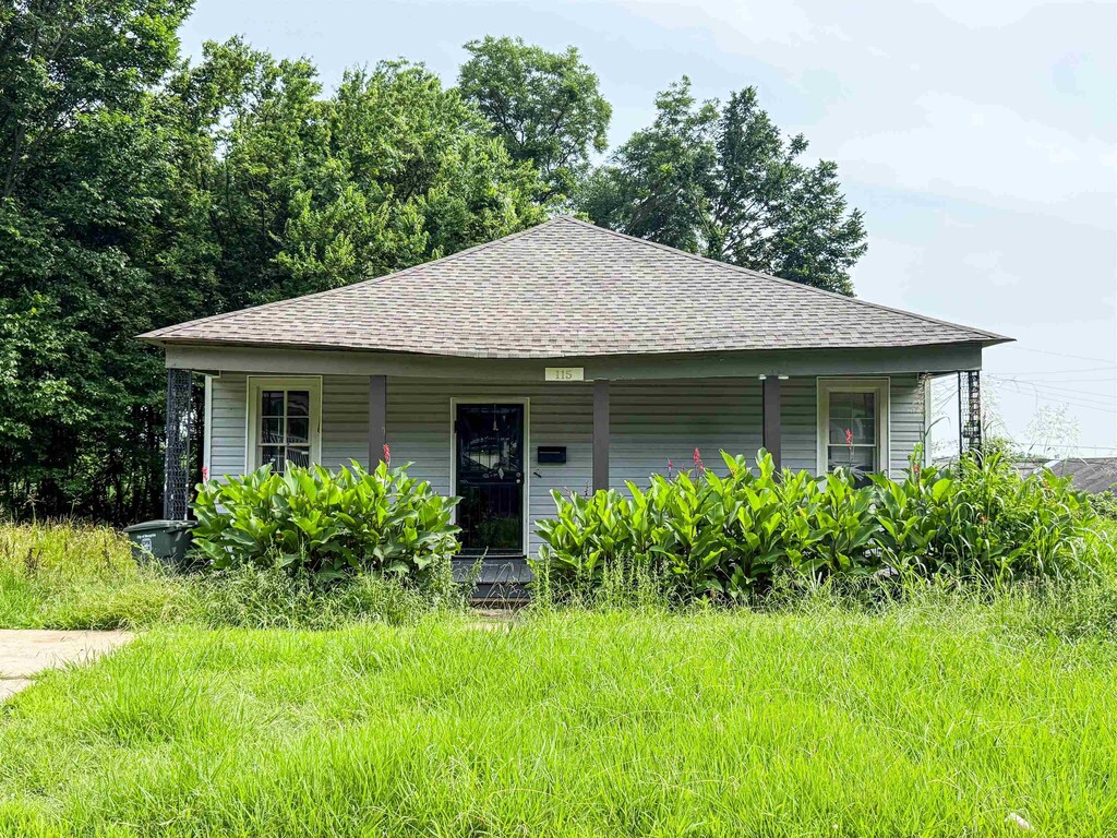 115 E Dempster Ave, Memphis, TN 38109 - bungalow with roof with shingles and a porch