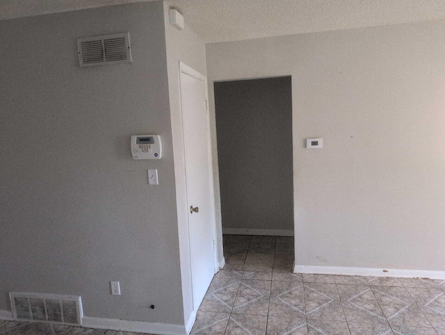 4915 Foxhall Cv, Memphis, TN 38118 - empty room with baseboards and light tile patterned floors
