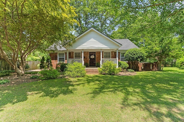 4670 Kaye Rd, Memphis, TN 38117 - view of front of house featuring brick siding and a porch