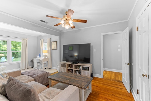 4670 Kaye Rd, Memphis, TN 38117 - living room with a ceiling fan, ornamental molding, and wood finished floors