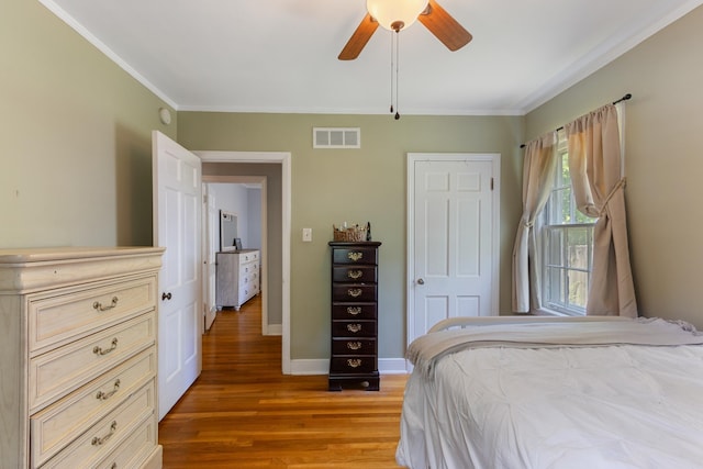 4670 Kaye Rd, Memphis, TN 38117 - bedroom featuring light wood finished floors, crown molding, and ceiling fan