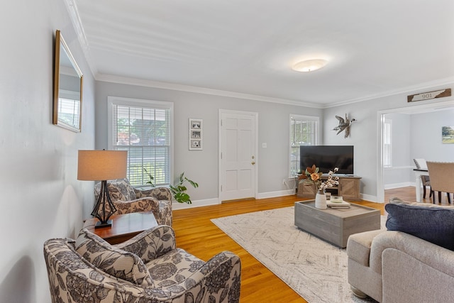 4670 Kaye Rd, Memphis, TN 38117 - living area with plenty of natural light, ornamental molding, and wood finished floors
