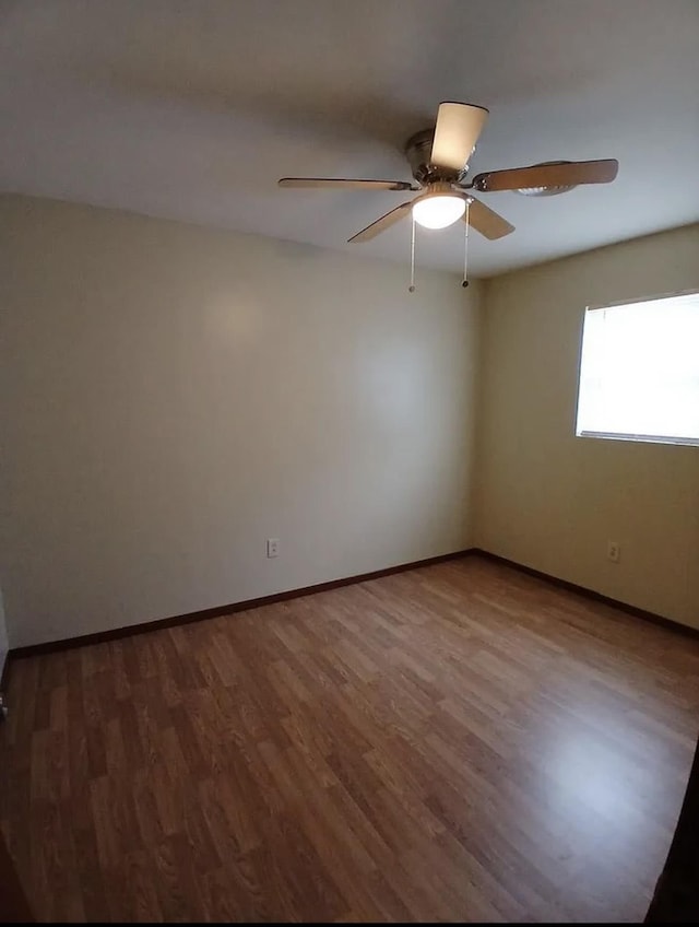 4005 Sewanee Rd, Memphis, TN 38109 - unfurnished room with wood finished floors and ceiling fan
