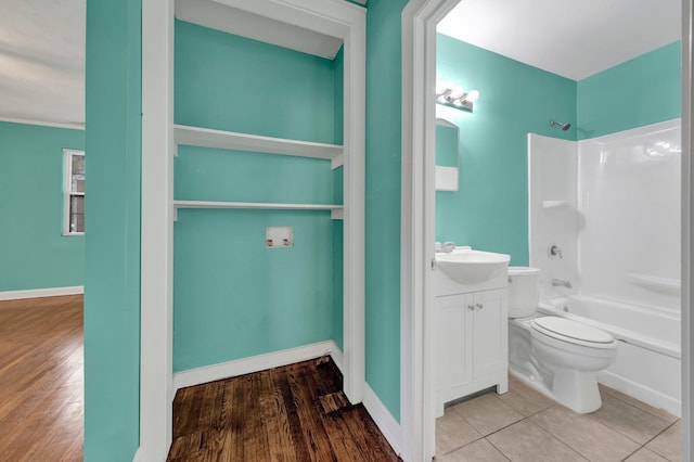 2154 N Hubert Cir, Memphis, TN 38108 - bathroom featuring vanity, shower / washtub combination, and wood finished floors