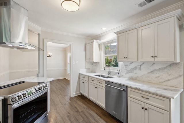 8394 N Westfair Cir N, Germantown, TN 38139 - kitchen with appliances with stainless steel finishes, wall chimney exhaust hood, tasteful backsplash, dark wood-style floors, and crown molding