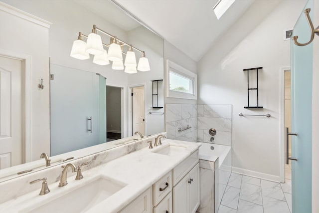 8394 N Westfair Cir N, Germantown, TN 38139 - bathroom featuring marble look tiles, double vanity, a bath, a skylight, and high vaulted ceiling