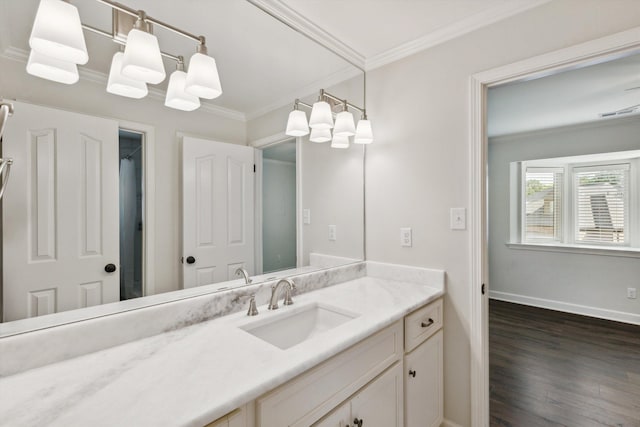 8394 N Westfair Cir N, Germantown, TN 38139 - bathroom featuring ornamental molding, vanity, and wood finished floors
