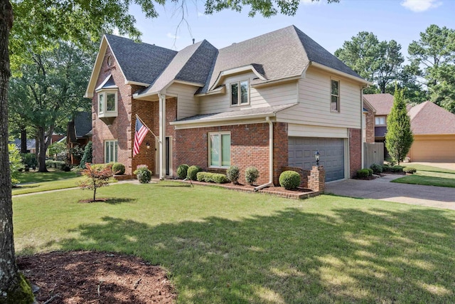 8394 N Westfair Cir N, Germantown, TN 38139 - view of front facade featuring brick siding, driveway, an attached garage, a front yard, and roof with shingles