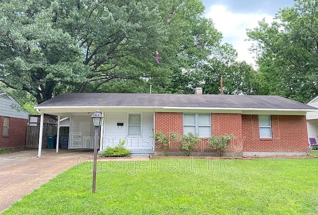1750 Sea Isle Rd, Memphis, TN 38117 - ranch-style home featuring concrete driveway, a carport, and brick siding