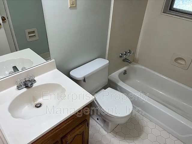 1750 Sea Isle Rd, Memphis, TN 38117 - bathroom featuring vanity, tile patterned floors, and bathing tub / shower combination