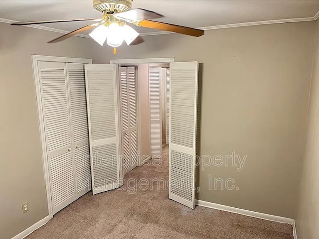 1750 Sea Isle Rd, Memphis, TN 38117 - unfurnished bedroom with carpet, crown molding, and ceiling fan
