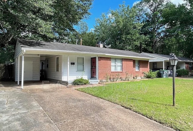 1750 Sea Isle Rd, Memphis, TN 38117 - ranch-style home featuring an attached carport, concrete driveway, brick siding, and roof with shingles