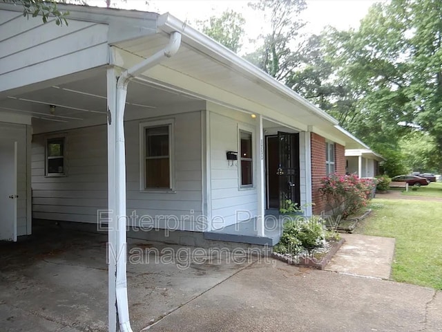 1750 Sea Isle Rd, Memphis, TN 38117 - entrance to property with a yard and an attached carport